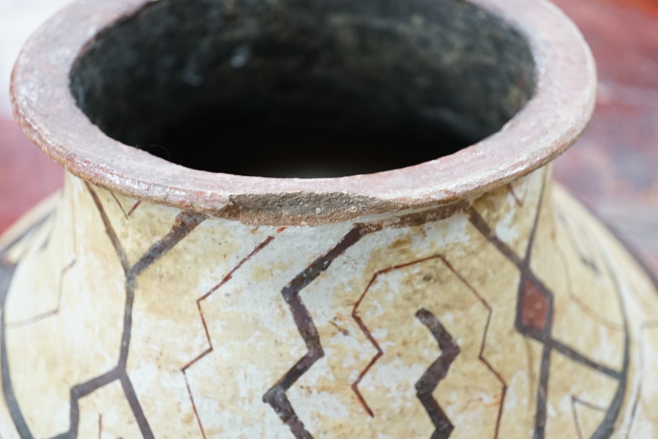A Shipibo pottery water vessel with geometric pattern, Peru, 26cm tall